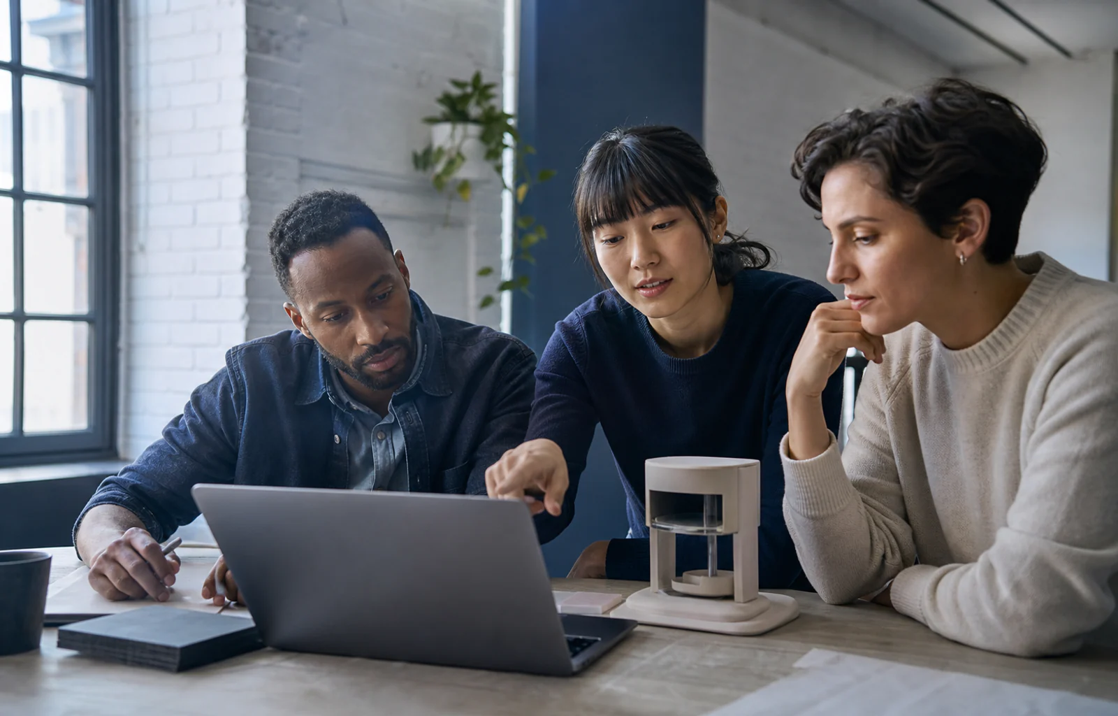 International startup founders reviewing a product and U.S. launch plan together